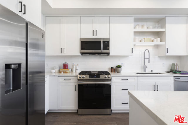 11950 Erwin Street Street, North Hollywood CA: https://media.crmls.org/mediaz/845a40af-b0ea-420b-9951-108d20a49968.jpg