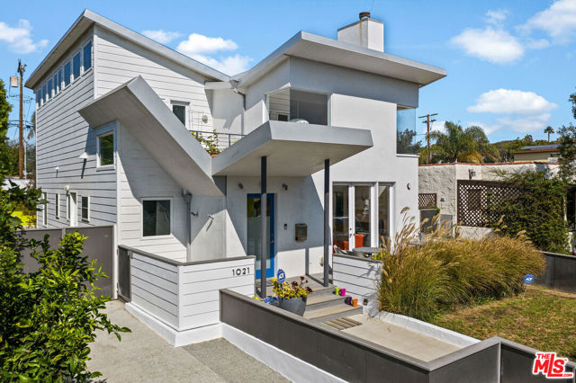1021 Pine Street Santa Monica, California Located on a quiet beautiful tree-lined street this inviting architectural home should not be missed! Featuring a double butterfly roof, a two-story living room with French doors that open onto the front deck creating that California lifestyle. The second story has a wonderful airy feel with high ceilings and 14 clerestory windows that allow light to flow in while still creating privacy. French doors open to the 400 SF deck with gas bbq hookup. Convenient additional kitchen/laundry room as well. Open floor plan with bamboo flooring throughout, complete with 3 bedrooms and 3 spa-like ensuites. A happy home with options for areas to work from home and spacious spaces for entertaining small and large gatherings. This home is well built with steel & all high-end finishes and a detached 2-car garage. A whimsical powder room perfect for guests. All within moments of shops, eateries, beach, and everything The Westside has to offer.