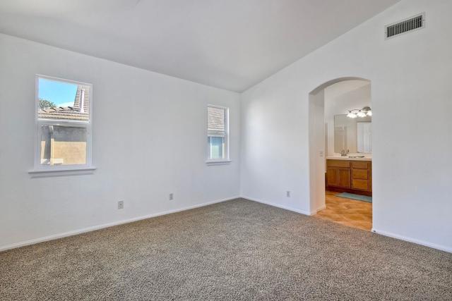 The primary bedroom adjoins the spacious primary bath/spa.