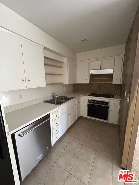 Drew Fenton | 833 Moraga Drive Los Angeles CA | MLS: 7495702