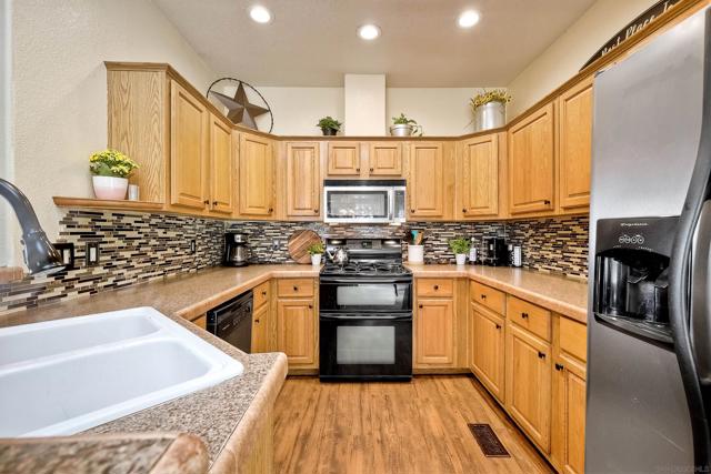 Spacious kitchen with a lot of cabinets in 2nd home.