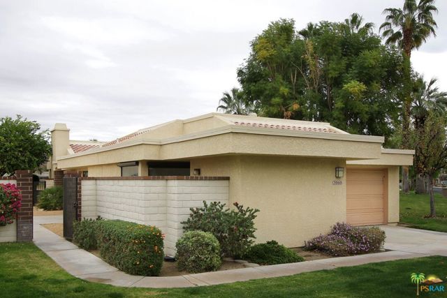 3060 Kirkwood Drive Palm Springs, California A rare opportunity to own a FREE STANDING property in West Gate PS at the Cathedral Canyon CC. With over 2,000 sq ft of living area, private entry courtyard, double car garage PLUS a golf cart garage, this 3 bedroom, 2 bath condominium is like living in a single family home. A vaulted ceiling and large windows in the living/dining area and kitchen provide a feeling of spaciousness and an abundance of light. The kitchen has views of the golf course. From the oversize rear patio enclosed by a short brick wall there is a lovely view of the golf course, the green and pond which caters to a variety of birds. Storage abounds with 3 large bedroom closets and a storage loft in the garage. Part of the property has been updated and refreshed. The remainder awaits your creative touch. Heated pool and spa in the HOA.