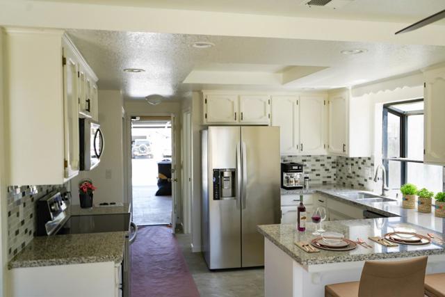396 Lancaster Drive, Manteca CA: https://media.crmls.org/mediaz/86c14b2b-6966-4549-bce4-ecea600986af.jpg