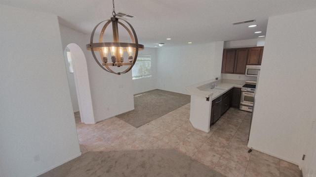 1446 Caminito Sardinia, Chula Vista CA: https://media.crmls.org/mediaz/87429316-13be-47b5-9c8f-2b46d6032bd9.jpg
