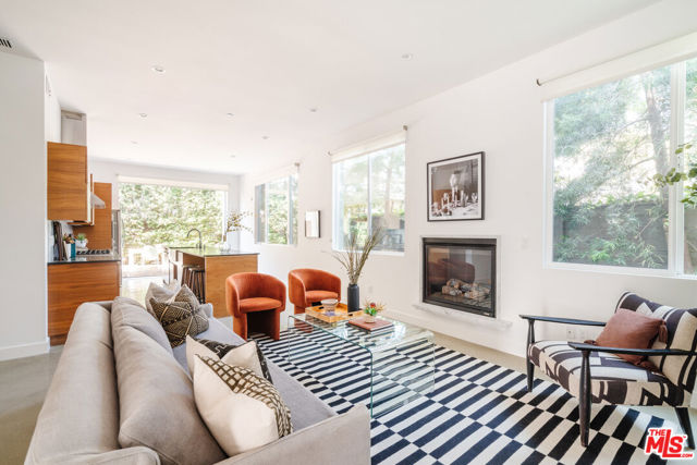 2437 WALNUT Avenue Venice, California Stylish, modern, and timeless, this stunning attached townhome with an oversized 3-car garage is beautifully finished and centrally located in the perfect neighborhood. Enjoy easy access to LAX, amazing surfing, and all the best shops and dining that chic Abbot Kinney has to offer. Full of that classic California charm, this home welcomes you with a contemporary open concept entertainment space flooded with natural light. Soaring ceilings are accentuated by designer fixtures and a beautiful picture window that brings the outdoors in. You will love entertaining friends and family here where guests can gather around the fireplace in the living room, at the bar of the exquisite kitchen, or in your private backyard oasis. Oversized sliding doors open the patio to the kitchen, where the chef of the family will be right at home with top-of-the-line finishes and appliances. Step up the soaring staircase where you will find three spacious and gorgeous bedrooms, each with large closets and an attached ensuite making it the perfect place to relax after a long day. Every inch of this home has been tastefully finished, ensuring years of effortless enjoyment to come. This home has so much to offer and won't last long. Property is available for lease as well.