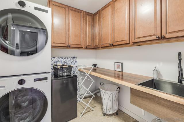 First Floor: Newly Upgraded Laundry room with High Efficiency LG Washer and Dryer.