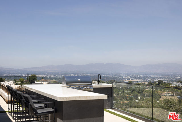 Drew Fenton | 16401 Mulholland Drive Los Angeles CA | MLS: 7706113