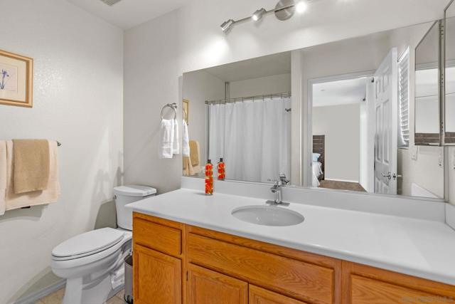 This private bath belongs to the 1st bedroom. It is spacious and offers a tub for relaxing.