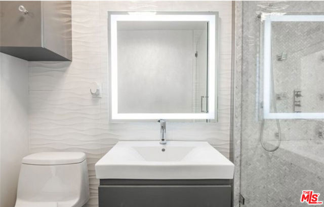 1228 N La Cienega Boulevard, West Hollywood CA: https://media.crmls.org/mediaz/8831b68d-cb4d-406c-a113-d2bfc91a0e86.jpg