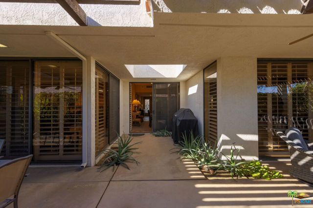 21 CORNELL Drive Rancho Mirage, California 21 Cornell presents a great opportunity to own in The Springs Country Club. This tastefully upgraded, tranquil and private home is situated in the interior of the Club and a short walk to a multitude of amenities. Bring your tennis or pickleball racket and enjoy the first-class courts. Join a league or take lessons with the many friends you have yet to make. Enjoy a massage, workout at the gym or play a round of golf at the stunning and professionally designed Springs golf course. A beautiful community pool offering golf and mountain views is only steps away. Your new home presents over 2900 square feet of luxury living. The large living and dining rooms welcome you and your guests. There are three large private patios. Enjoy the beauty and warmth of the large fireplace during the cooler winter months. Have breakfast in the gracious morning room after picking lemons and fresh oranges from your own mature fruit trees. There are three oversized, private en-suite bedrooms with room for an expansive wardrobe. The home offers a private laundry room and parking for two cars plus golf cart. The Springs is a gated Country Club and offers 24 hour on site security. For added peace of mind the renowned Eisenhower Medical Centre is minutes away. Your beautiful turnkey home is waiting for you to move in !!