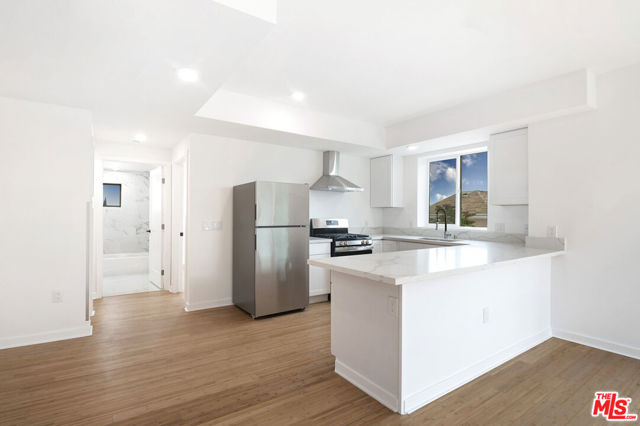 321 S Fickett Street, Los Angeles CA: https://media.crmls.org/mediaz/8918aa42-6c8a-4b7b-a7f6-5aedf9925b30.jpg