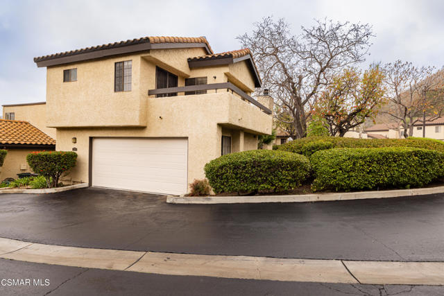 End unit, 2 car garage, balcony