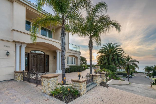 7401 Alida Place Rancho Palos Verdes, California Expansive Mediterranean estate on a cul-de-sac with ocean views. Spacious entry with winding staircase leading to main living quarters on 2nd level to take advantage of the panoramic ocean views. Huge patio with French doors extending from Living Room and Master Bedroom. Master retreat with fireplace is private from the rest of the home and has wet bar for your morning coffee or evening cocktail to enjoy on the patio. Master Bath and Walk In Closet with custom shelving complete the Master Suite. Updated Kitchen with separate prep kitchen and built in bar open to the Dining area. Family Room showcases entertainment center, with separate access to garage & side yard from rear bedrooms. Additional 5 Bedrooms complete the 2nd floor with generous storage and laundry room. Huge ground floor rec room/game room with kitchenette opens to paved patio area. Unique floor plan with separate downstairs quarters with 3 bedrooms and separate laundry on both levels. Close to Lunada Bay, Golden Cove Shopping Center, hiking and trails.