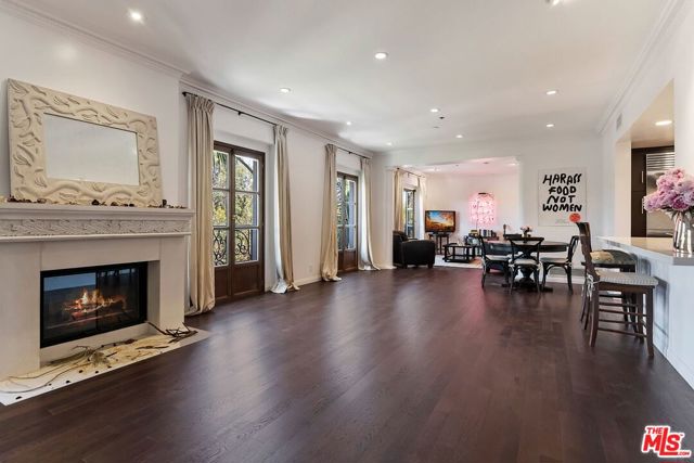 425 N Maple Drive 504 Beverly Hills, California Recently renovated unit at the iconic Le Faubourg St. Louis, one of the most prestigious full-service residences in prime Beverly Hills. Experience luxury in this 2,314 SF unit with designer touches throughout including marble and wood flooring and updated kitchen with stainless steel appliances. French doors throughout the unit create a bright and airy feeling in the living and dining rooms. Spacious primary suite offers dual walk-in closets, marble bathroom with floating vanity, and oversized glass shower. 2 addition ensuite bedrooms provide ample space. Residents enjoy valet parking, concierge services, controlled access, 24/7 security, a fitness center, pool, and spa. Three side-by-side parking spaces are available for added convenience. The building is also nearing completion of a $1M renovation to the interior courtyard. Situated on the famed Maple Drive, Le Faubourg is just minutes from Rodeo Drive and the finest shopping and restaurants of Beverly Hills.
