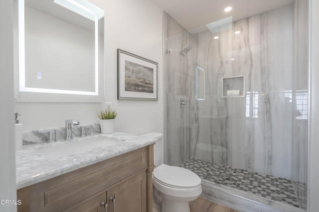 Guest bath (1) Oak Vanity w/Marble Top