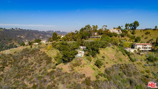 1785 BEL AIR Road Los Angeles, California Here's an exciting opportunity to create a major Bel-Air estate in the company of some of the most important and prestigious homes in Los Angeles. With exhilarating, sweeping views of the city, canyons and mountains, this just over 13-acre-parcel is for sale for the first time in decades. The site offers unparalleled privacy and seclusion in a tranquil, natural, maturely-wooded setting with great potential to create a very special hillside manor with one of the best internationally recognized addresses in town. Bel-Air is located moments away from UCLA, Westwood and Beverly Hills and is a short drive to the Pacific Ocean. Please do not disturb caretaker of existing residence. Shown by appointment only.