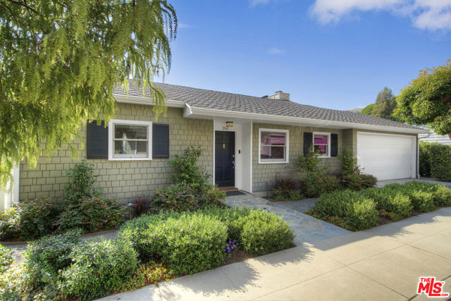1343 Goucher Street Pacific Palisades, California Immaculate tastefully remodeled gem with lovely ocean, mountain, & tree-top views in quiet close to Palisades Village location. This turn-key home has been thoughtfully updated by the current owner with meticulous attention to detail, a beauty inside & out. The traditional shingle style exterior welcomes you with its appealing curb presence, & every step into this beauty provides delightful, airy interiors & serene views. Impressive updates include the kitchen, both bathrooms, all the doors, windows, decks, lighting, plumbing, HVAC, flooring, staircases, roof, siding, front & back landscaping, hardscape & more! Exterior space includes a beautiful stone terrace with a spacious dining area, outdoor kitchen, & areas for conversation & relaxation. The back yard is delightfully planted with paths, gardens, & enchanting lighting. You will fall in love with this Shangri-La offering location, views, & sophisticated style!