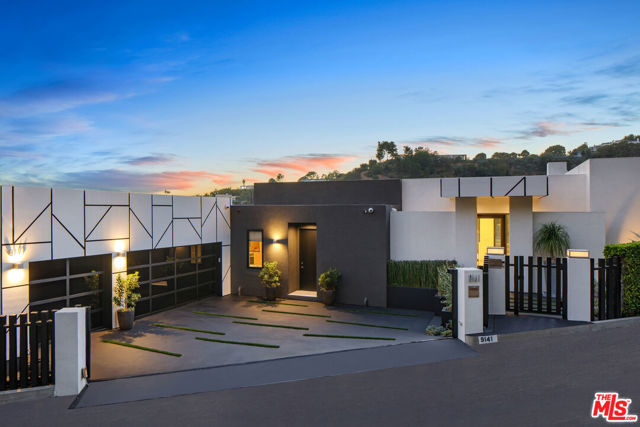 9141 Thrasher Avenue Los Angeles, California Spanning over 6,500 FT w/ views from Century City to Ocean- Best value & highest quality, 3M+ remodel top to bottom, just completed. Set on arguably the best cul de sac in the bird streets, gated & secure w/ 3-car garage & parking for 6. Architectural compound w/walls of glass & doors that seamlessly fuse the interior & exterior spaces. INCREDIBLE VOLUME- 12 ft ceilings & open floor plan w/approx 2500 SQFT covered outdoor space & designer details including limestone floors, custom lighting & gallery walls. Soaring great room w/ fireplace & bar opens to a huge outdoor entertaining space that hosts a dazzling pool & spa. Formal dining rm & gourmet Poggenpohl kitchen includes sleek professional appliances. Take the elevator to the guest bdrm suites w/shared balcony & office. The master suite includes a fireplace, huge gorgeous master bathroom, custom boutique walk-in closet, bar/coffee station, & private zen garden. Lower lvl features theater, climate controlled wine room & gym.