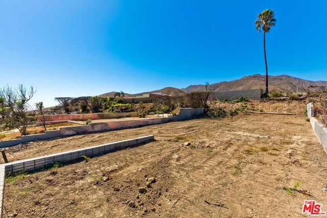 Drew Fenton | 3735 Malibu Vista Drive Malibu CA | MLS: 7116912