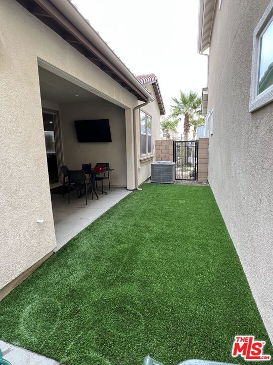 Side Yard & Outside Room