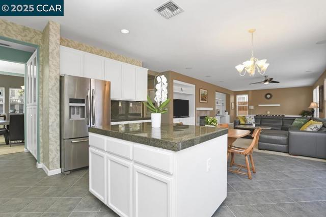 755 Boltzen St, Brentwood CA: https://media.crmls.org/mediaz/8b7520b9-7b4e-403a-b99c-d6d3f4059d3c.jpg
