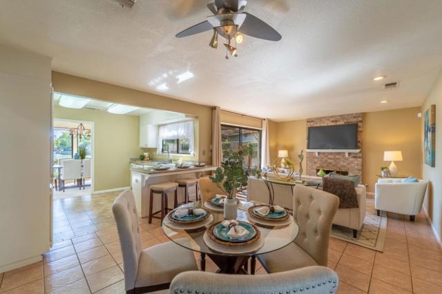 Kitchen breakfast nook, open concept with the family room next to it. Amazing views of the lake!