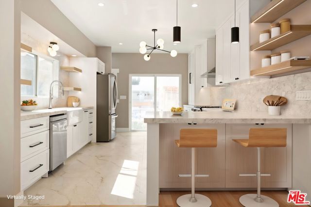 1558 W 47th Street, Los Angeles CA: https://media.crmls.org/mediaz/8d6bc805-cb3d-40c2-97f7-2e10a64a7198.jpg