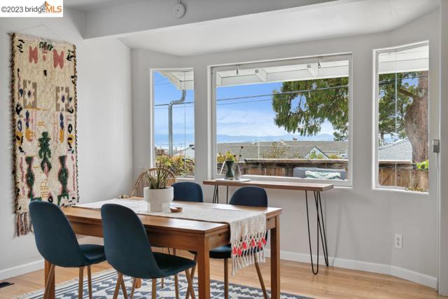 A large bay window in the dining area lets the light shine in!