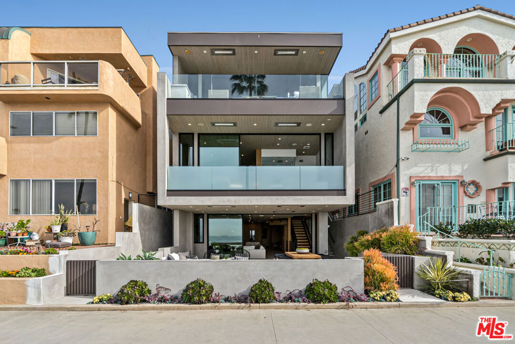 Welcome to 4016 The Strand, where luxury living meets beachfront bliss! Immerse yourself in the quintessential Southern California lifestyle in this brand new modern masterpiece, boasting unobstructed panoramic ocean views from every level. With 4 bedrooms and 6 bathrooms spanning over 3500 sqft across three stories, there's ample space for your family and friends to bask in the sun, sand, and surf. Indulge your inner chef in the custom kitchen, outfitted with top-of-the-line Miele oven and dishwasher, Thermador fridge/freezer, and Subzero wine fridge. Take the private elevator down to the home theater and game room for some rest and relaxation, or savor the ocean breeze on the expansive 700 sqft patio on beach level, complete with an outdoor kitchen. Retire to the luxurious primary suite and soak in the breathtaking views from your private balconies. After a day of sun and sea, rinse off in the outdoor shower and cozy up on the patio with the outdoor heaters as you watch the sun sink into the horizon. The driveway leads to a 2-car garage and a guest parking space, making parking a breeze. Located just a stone's throw from the iconic Manhattan Beach Pier and some of the South Bay's finest dining and shopping, this incredible beachfront abode offers the ultimate coastal living experience. Come live the dream at 4016 The Strand!