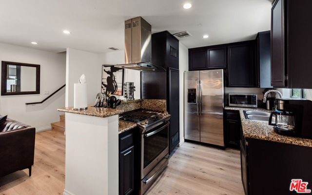 1540 N Bronson Avenue, Los Angeles CA: https://media.crmls.org/mediaz/8ed97053-3f8f-4496-87da-123982bf13e6.jpg