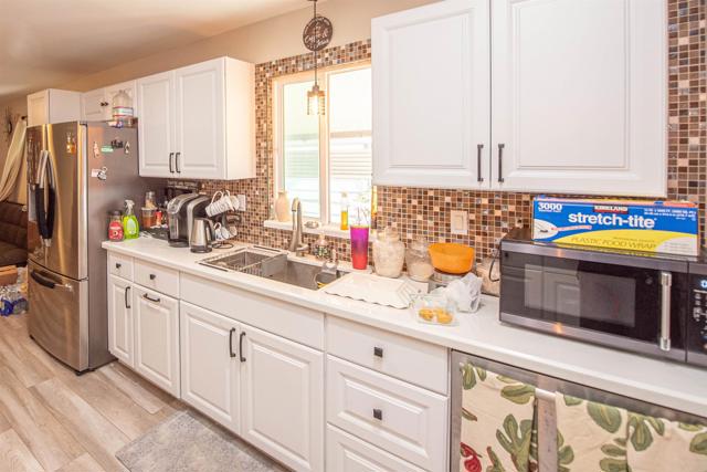 1010 Bobier Dr E, Vista CA: https://media.crmls.org/mediaz/8faf7831-cbda-4b45-a842-080822abaad8.jpg