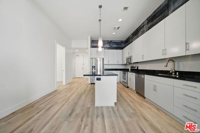 3223 W 6th Street, Los Angeles CA: https://media.crmls.org/mediaz/91118896-03c0-4b9b-bdc6-48d9489e00f6.jpg