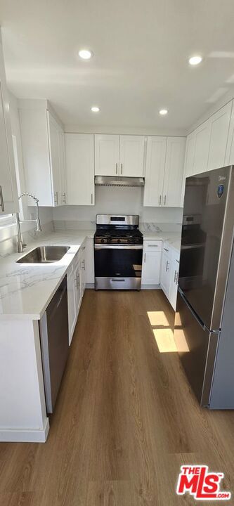 1308 N Poinsettia Place, Los Angeles CA: https://media.crmls.org/mediaz/914dd3f4-eef3-4133-ace0-488ba9c6e71e.jpg