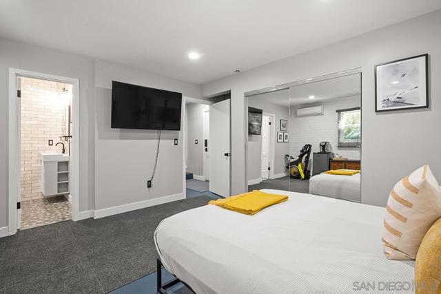 Downstairs master bedroom with it's own private entrance and an en suite bathroom.