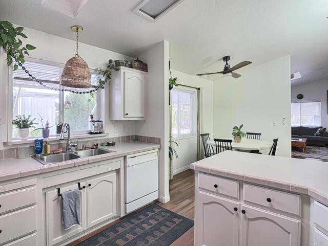 Detail Gallery Image 1 of 26 For 2003 Bayview Hts #105,  San Diego,  CA 92105 - 3 Beds | 2 Baths