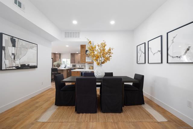 Formal dining area off the kitchen, beverage cooler at elbow of the kitchen