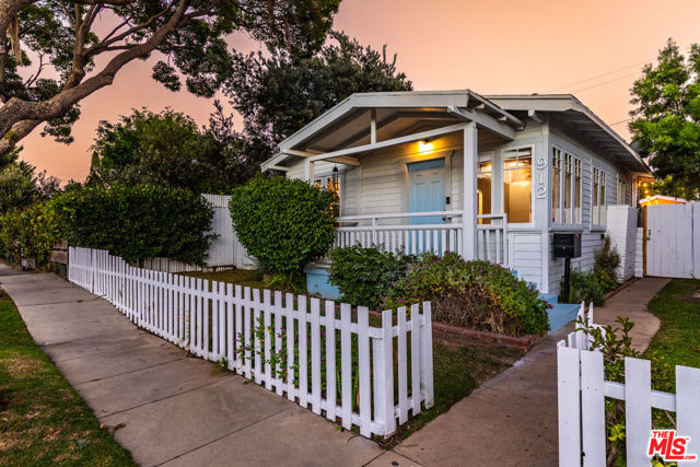 Welcome home to the quintessential Venice Beach bungalow compound!  Step through the white picket fence into the very sweet front California Craftsman home that features 2 bedrooms, one bath and a pine vaulted ceiling spanning the living area.  New Mini-splits in both bedrooms and living area keep you cool in the Summer and warm in the Winter!  Eat-in kitchen with custom built-ins and new Quartz Counters highlight the kitchen.  A spacious patio and grassy backyard spotlight a one bedroom/one bath separate cottage, perfect for a Nanny or extended family, with a full kitchen and bath. There is also a large, detached bonus room, great for games, TV, or an office.  Parking is available with one spot off alley and on  street. Enjoy walking distance to Abbot Kinney, and a short bike ride to the beach.  Watch beautiful evening sunsets from your front porch.  Wonderful Venice neighborhood is close to everything. This is the perfect home for an extended family or the person who works from home and needs extra space.  Welcome home!