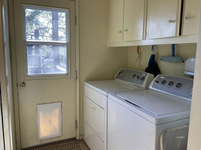 18 Utility area off kitchen with door to