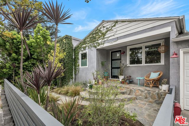 3216 17th Street Santa Monica, California Are you dreaming of the loveliest jewel-box home in the sweetest neighborhood of Sunset Park? Well, dreams do come true! This designer remodeled 3 bedrooms, 2 1/2 bath home is brimming with special touches. Hardwood floors flow through the whole home, and the dining area and open kitchen are outfitted with a Fagor Fridge and Aga range. The bright living room has custom skylights that give it a whimsical earthy style that shines throughout. Two generously sized bedrooms share a bathroom, each with a private sink area, and tub/shower combo with playful detail. The master bedroom sits at the back of the property making it its own private oasis with an attached sitting room, perfect for an office, nursery, or meditation area. The outdoor spaces are equally magical. Off of the kitchen you'll find an al fresco dining patio with retractable overhead awnings for those summer dinners. A built-in water feature adds delightful background music. The big, turfed backyard also features an outdoor living room, centered around a built-in fire pit just screaming for S'mores. There's room for the pups and the kids to play, as well as for a napping hammock. Mature landscaping, cafe lights, and that beautiful Brazilian Pepper tree dripping with lanterns - you'll never want to leave. The 2 car garage is finished if you'd like to set up a home gym or yoga studio - and there are endless custom details like Ann Sacks tile and House of Hackney wallpaper. And it's all around the corner from Marine Park and close to Bob's Market and all the great shops and dining on Ocean Park.