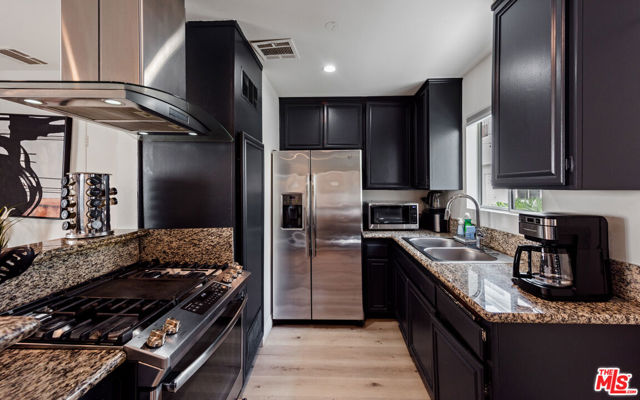 1540 N Bronson Avenue, Los Angeles CA: https://media.crmls.org/mediaz/92d0d5f1-33cc-4e8e-82bc-9cde5a4accf1.jpg