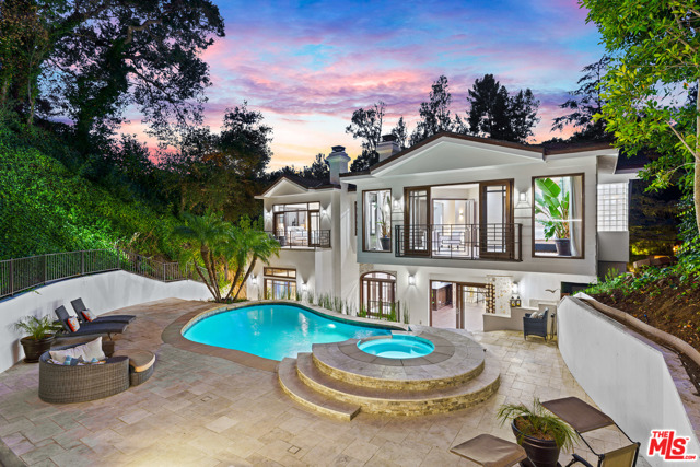 2650 Hutton Drive Beverly Hills, California Built around the art of entertaining, stands this updated celebrity compound. Set on a sprawling 21,000+ sqft lot, boasting designer finishes at every turn. A formal living room with vaulted ceilings and exposed wood beams, flow to a formal dining room and family room. Enjoy the 5 Ss of wine (see, swirl, sniff, sip, and savor) in your own wine tasting room! A gourmet kitchen with high-end stainless-steel appliances and tons of cabinetry. Work out in your private gym, with a steam shower and an oversized jetted tub. Invite the gang and catch up on all your favorite movies in the custom media room. Relax in luxury in the oversized 5-star master suite. A large sitting area in front of the fireplace, a large balcony that overlooks the park-like grounds and a spa-like bath fit for royalty! A shopaholics dream, the oversized closet is perfect for showcasing and storing for every season. A sparkling pool with hot tub, a large deck area, a soothing water feature and lounge area with a roaring