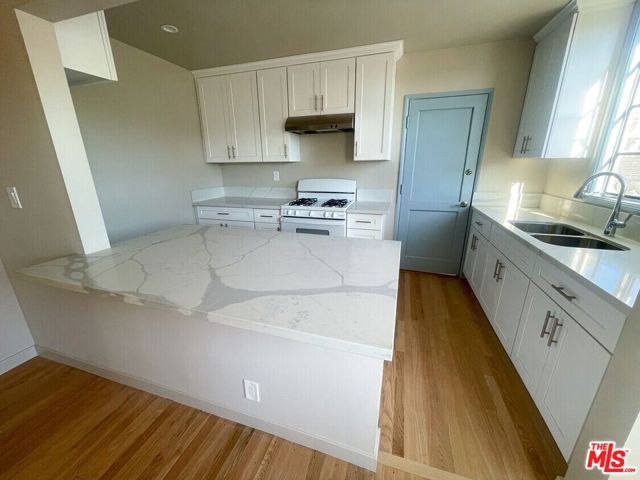 1241 N Crescent Heights Boulevard, West Hollywood CA: https://media.crmls.org/mediaz/939e0bdb-30b0-48ee-bf27-0cf1468f18ee.jpg