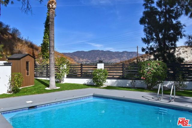 12112 Woodley Avenue, Granada Hills CA: https://media.crmls.org/mediaz/93c4489b-87fd-47a0-9afd-f0ee060403cf.jpg