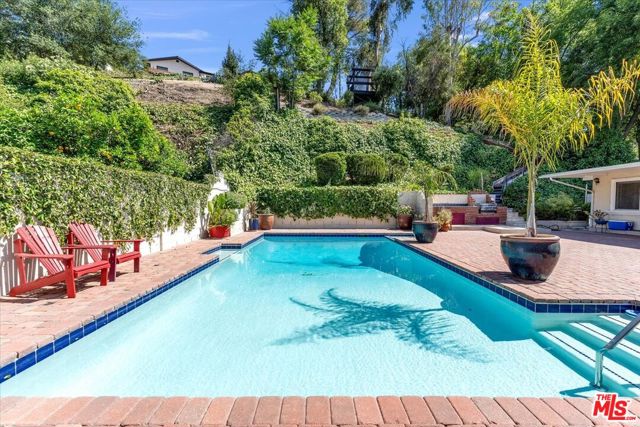23264 Calvert Street, Woodland Hills CA: https://media.crmls.org/mediaz/93d67b98-2663-476b-afe2-18b00a3fa0f9.jpg