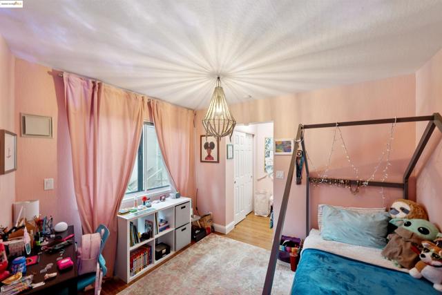 Bedroom featuring light wood-style flooring