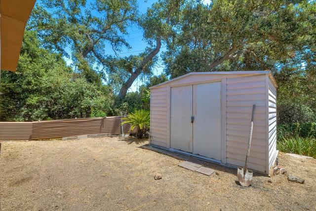 Back yard with shed.