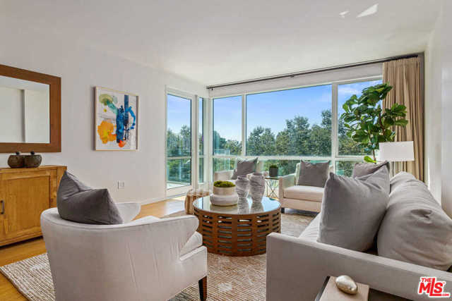 1705 Ocean Avenue 314 Santa Monica, California Modern, luxury living at the prestigious Waverly building on prime Ocean Avenue. Designed by world-renowned Marmol Radziner and developed by award-winning Related Company, this newer (2014) 2-bed + 2.5-bath residence features an open and airy floor plan, private balcony and floor-to-ceiling walls of glass, highlighting the greenery of Tongva Park, ocean, mountain and city views. Contemporary kitchen features quartzite countertops, custom cabinetry and Thermador appliances. The primary suite includes a balcony, walk-in closet and spa-like bathroom w/ separate tub, shower + dual sinks. Create your home office in the inviting den space. Spectacular building w/ 24-hour concierge, state of the art gym, storage, side x side parking, Starbucks and the 5th-floor Sky Bridge lounge - the perfect place to entertain with full kitchen, BBQ, fireplace and panoramic views of the Pacific Ocean. Premier Santa Monica location, moments from the Beach, SM Pier, Main St, 3rd Street Promenade and more.