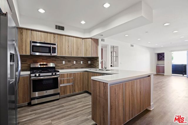 1301 Brockton Avenue, Los Angeles CA: https://media.crmls.org/mediaz/959c7ce6-5ff7-476a-89ab-64121647d353.jpg