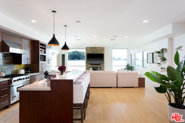 1712 Abbot Kinney Boulevard 1/2 Venice, California Situated on Abbot Kinney, this private, architectural retreat offers you urban modern living at its finest! Designed by notable architect Juan Garcia-Murari, AIA: LEED AP, this sophisticated and spacious 2 Bedroom/3 Bath home encompasses a spacious open floor plan, soaring ceilings, and the perfect design details that will take your breath away. //We Love: The warm and inviting main floor that cohesively blends together your picturesque living room w/ a fireplace that is a centerpiece to space and your large chef's kitchen w/ rich walnut cabinetry and Viking appliances. Enjoy your airy master suite, with a large walk-in closet and incredible master bath w/ a Jacuzzi tub. //You'll Love: The expansive rooftop deck that allows you to capture world-renowned sunsets and panoramic views while entertaining family and friends. //The Neighborhood: Situated in the heart of Venice and a nearly perfect walk score of 93, enjoy critically acclaimed restaurants, bars, and boutiques at your doorstep!