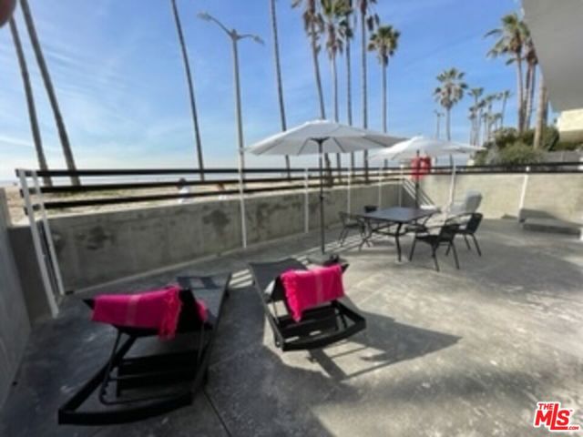 This unique beachfront townhouse  located right on the beach  has just been remodeled offering a fresh and modern design and ready to host her first guests.The space was designed by French Interior Designer Lawrence Agi. Style and functionality are the key words that takes you to great comfort in this house with spectacular ocean views.The townhome has a Brand new kitchen and bathrooms as well brand new hardwood floors.Enjoy this unique experience of living right on the boardwalk and spend time on your beautiful deck  where you can enjoy, the palm trees, the sand and the ocean.
